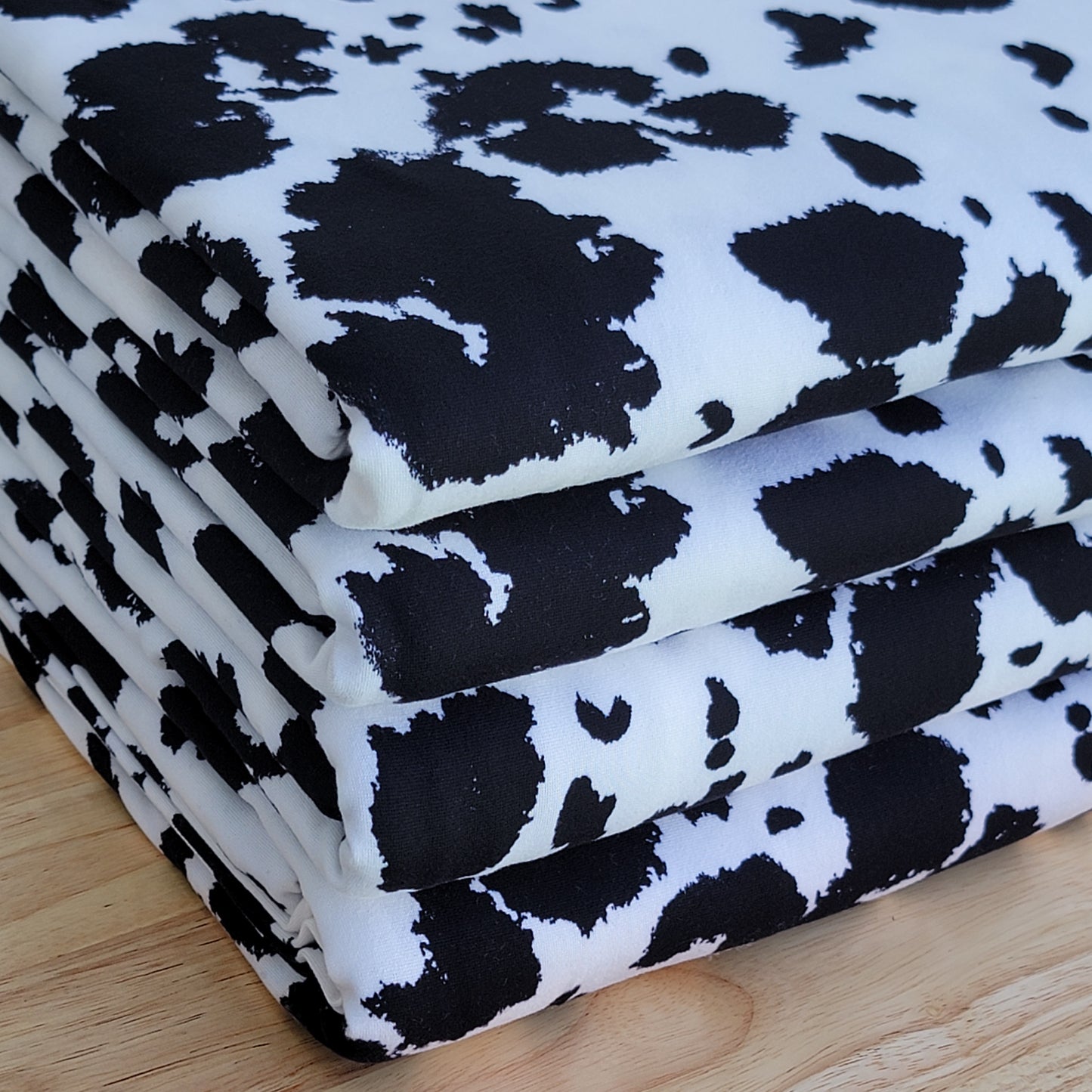 Black and White Cow Print Double Brush Poly