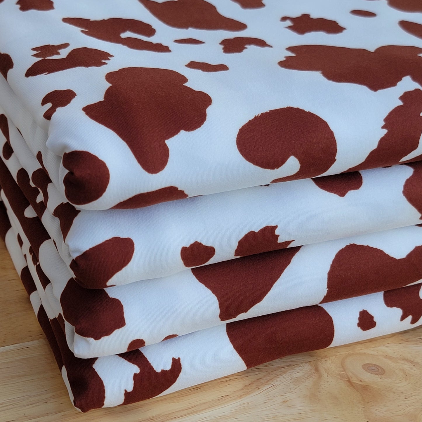 Printed Double Brush Poly Brown Cow Print