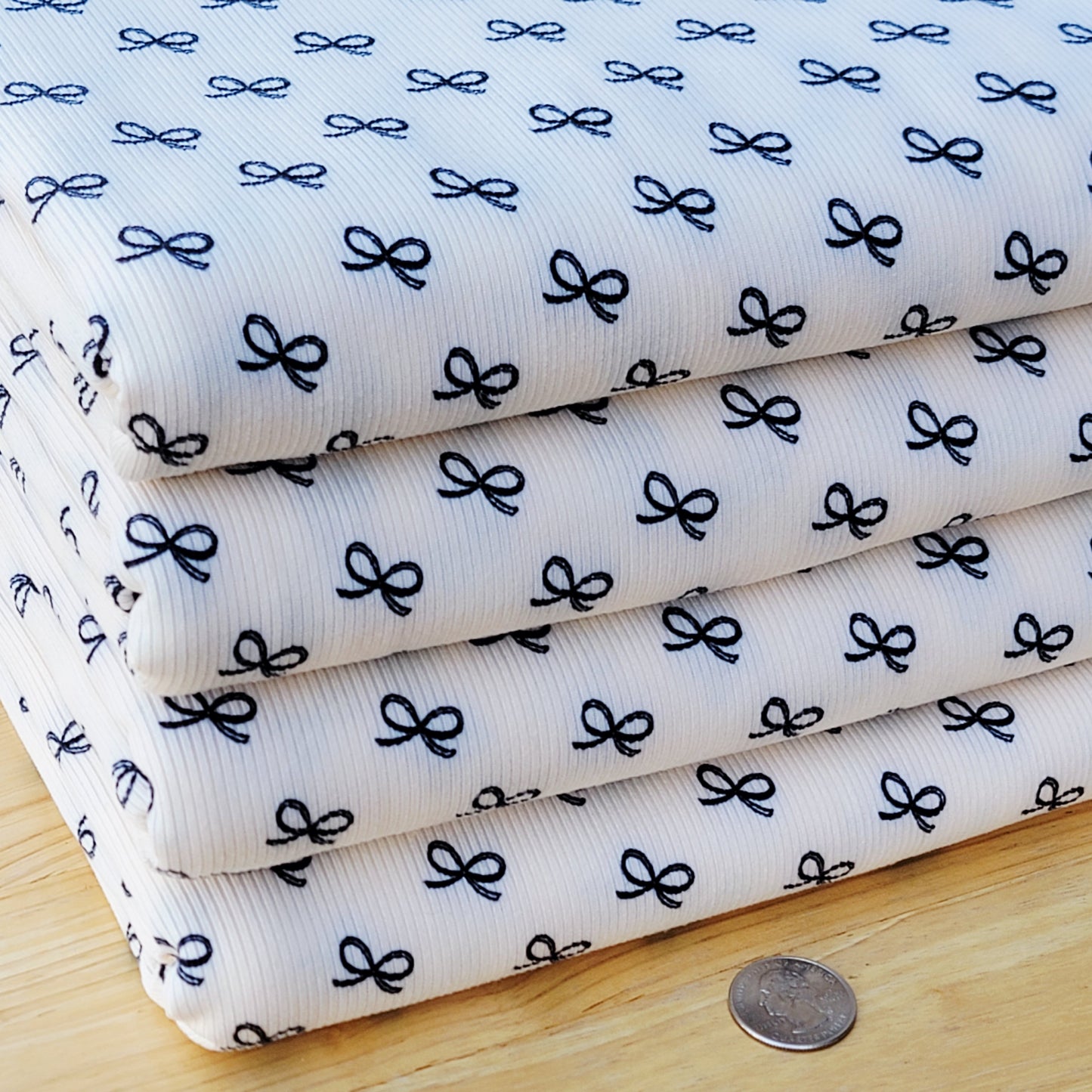 2x2 Yummy Rib Small Black Bows Print