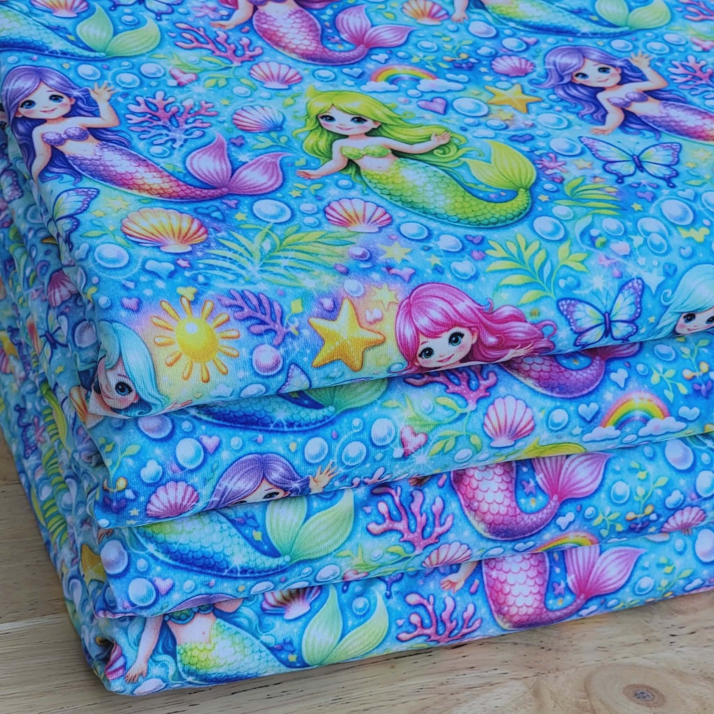 Double Brushed Poly Mermaids Print